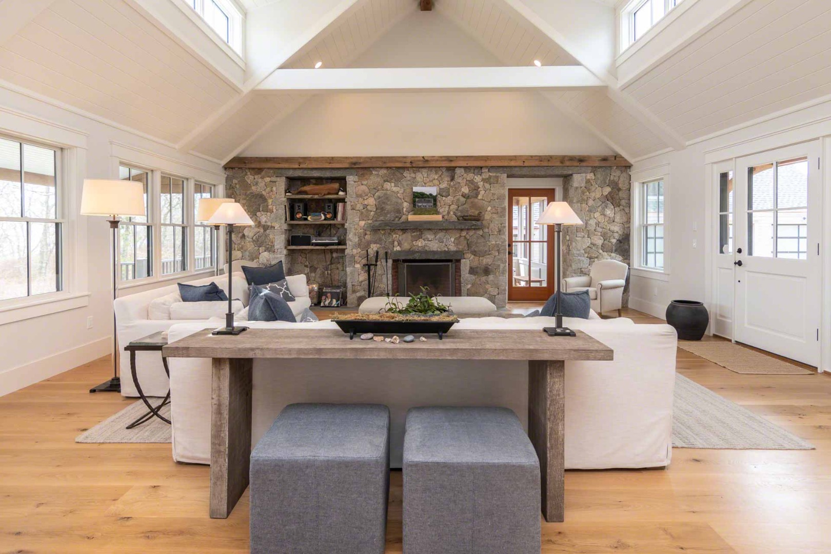 59 Seth's Way Edgartown, MA 02539 - Photo 13 of 46 a living room with fireplace furniture and a large window