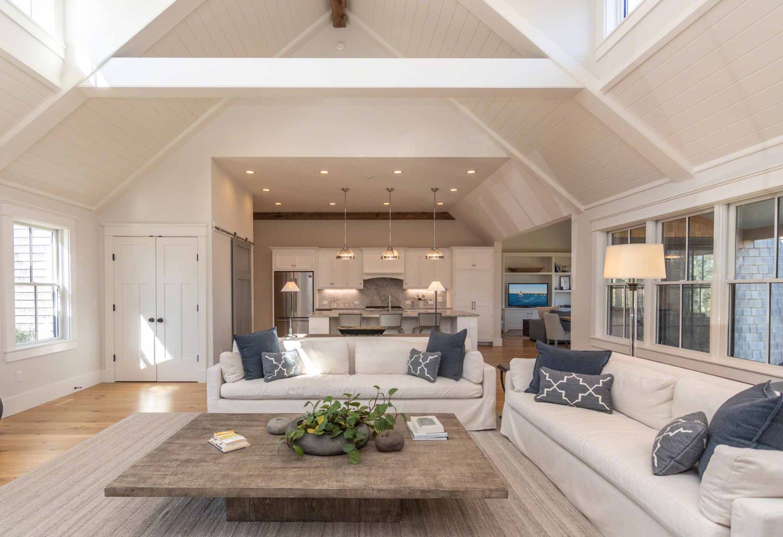 59 Seth's Way Edgartown, MA 02539 - Photo 14 of 46 a living room with furniture and a large window