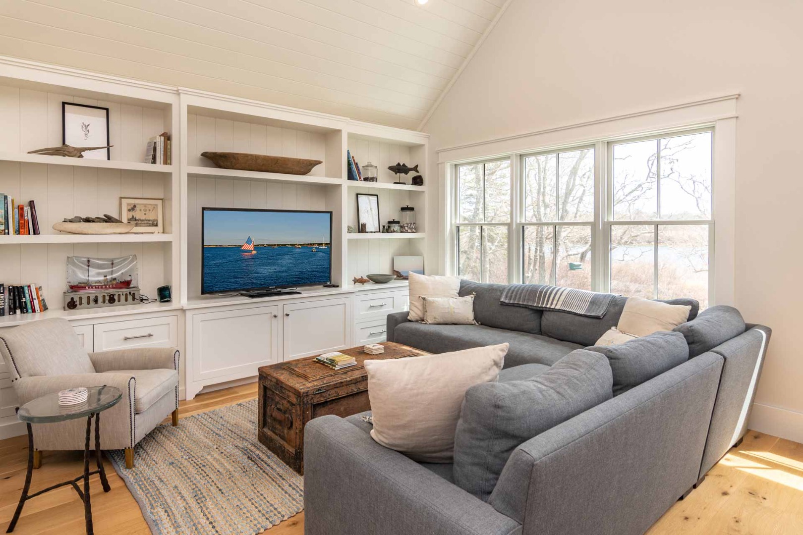59 Seth's Way Edgartown, MA 02539 - Photo 17 of 46 a living room with furniture and a flat screen tv