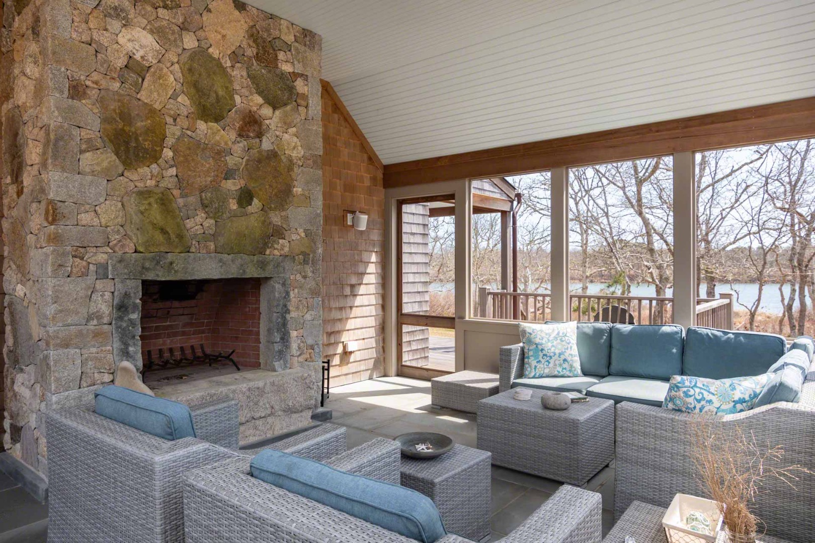 59 Seth's Way Edgartown, MA 02539 - Photo 22 of 46 a living room with furniture and a fireplace