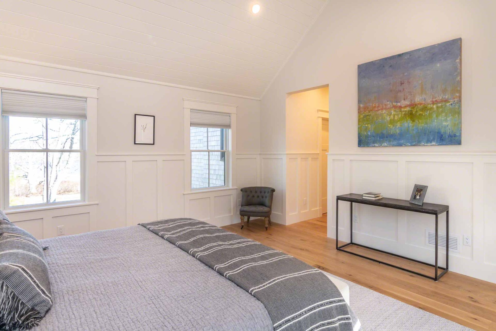 59 Seth's Way Edgartown, MA 02539 - Photo 27 of 46 a bedroom with a bed and a flat screen tv