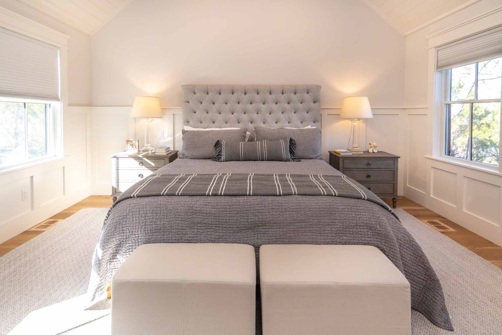 59 Seth's Way Edgartown, MA 02539 - Photo 28 of 46 a bedroom with a bed and wooden floor