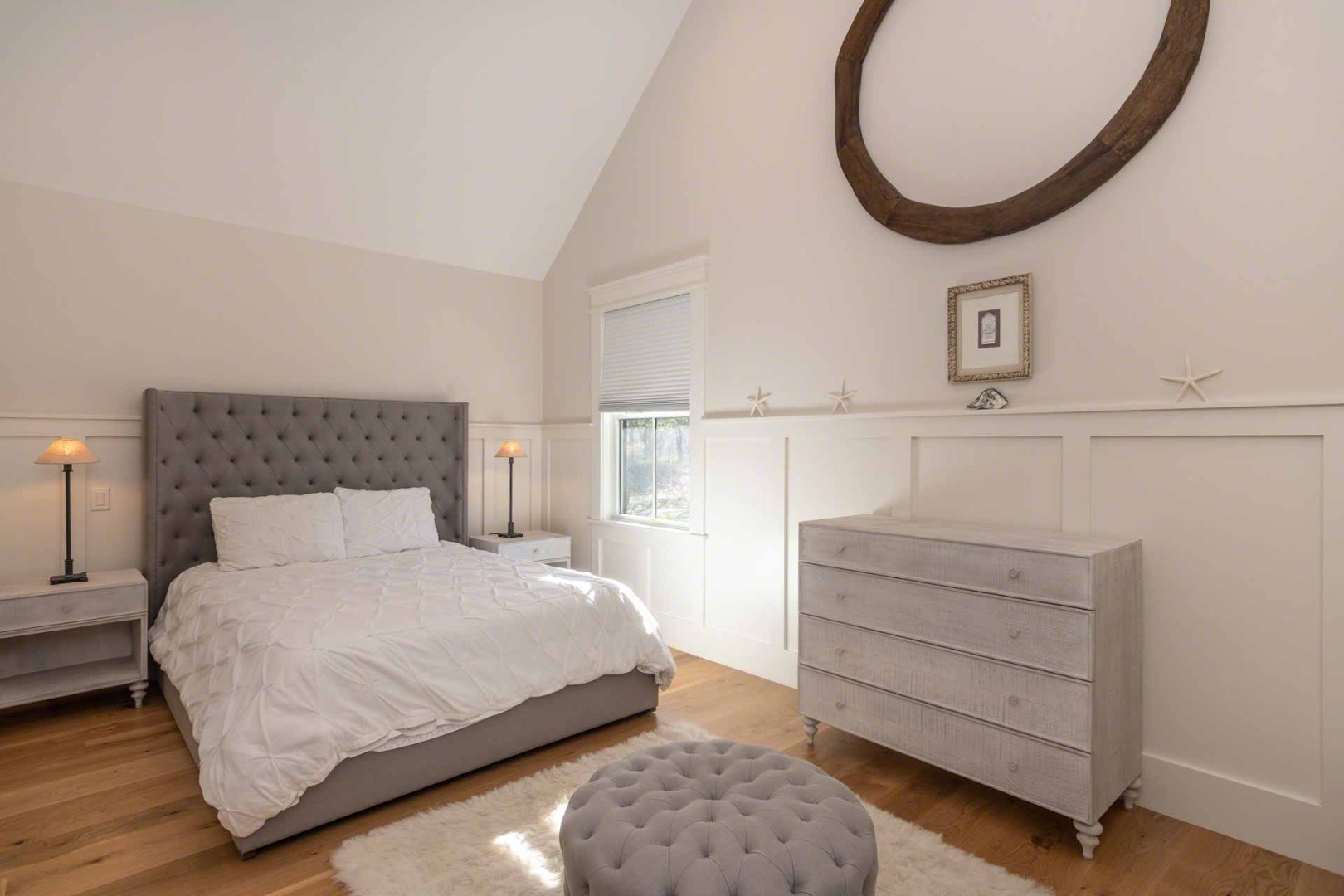 59 Seth's Way Edgartown, MA 02539 - Photo 31 of 46 a bedroom with a bed and a mirror