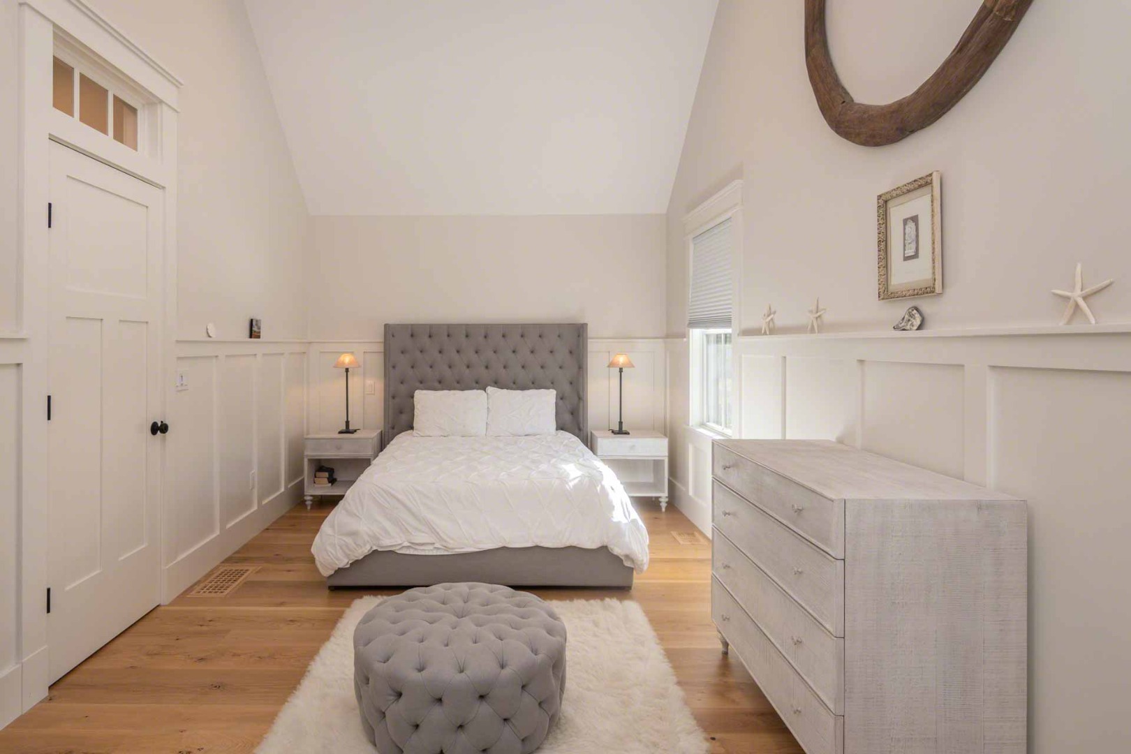 59 Seth's Way Edgartown, MA 02539 - Photo 33 of 46 a bedroom with a bed and a table in it