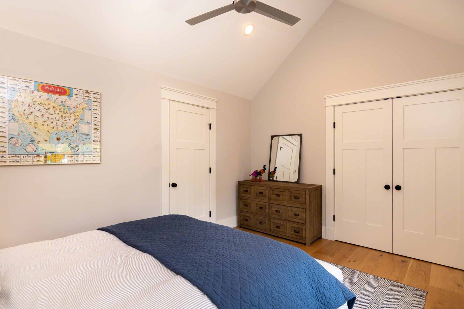 59 Seth's Way Edgartown, MA 02539 - Photo 37 of 46 a bedroom with a bed and a dresser