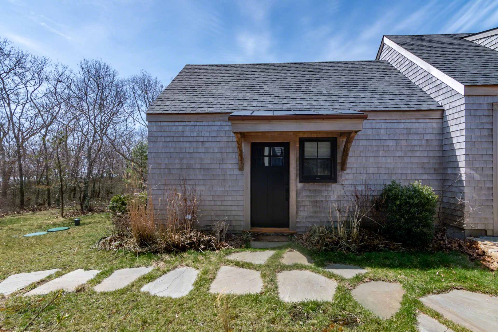 59 Seth's Way Edgartown, MA 02539 - Photo 39 of 46 a front view of a house with garden