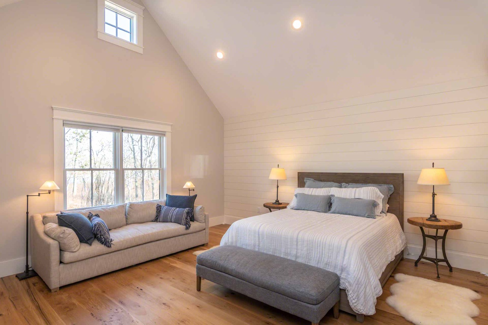 59 Seth's Way Edgartown, MA 02539 - Photo 40 of 46 a spacious bedroom with a bed and a couch