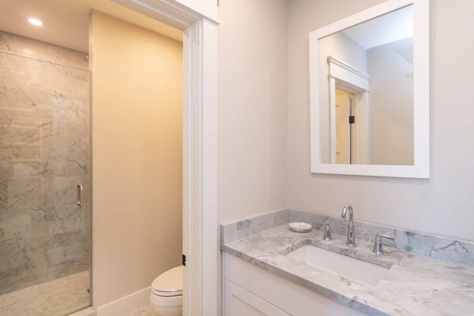 59 Seth's Way Edgartown, MA 02539 - Photo 42 of 46 a bathroom with a granite countertop sink toilet and mirror