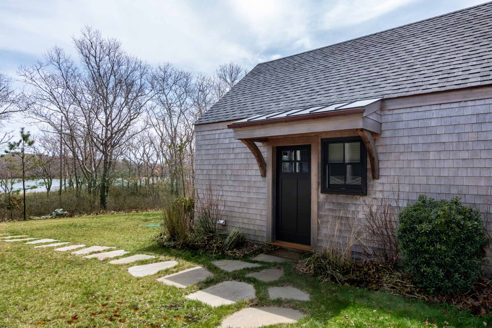 59 Seth's Way Edgartown, MA 02539 - Photo 43 of 46 a front view of a house with garden