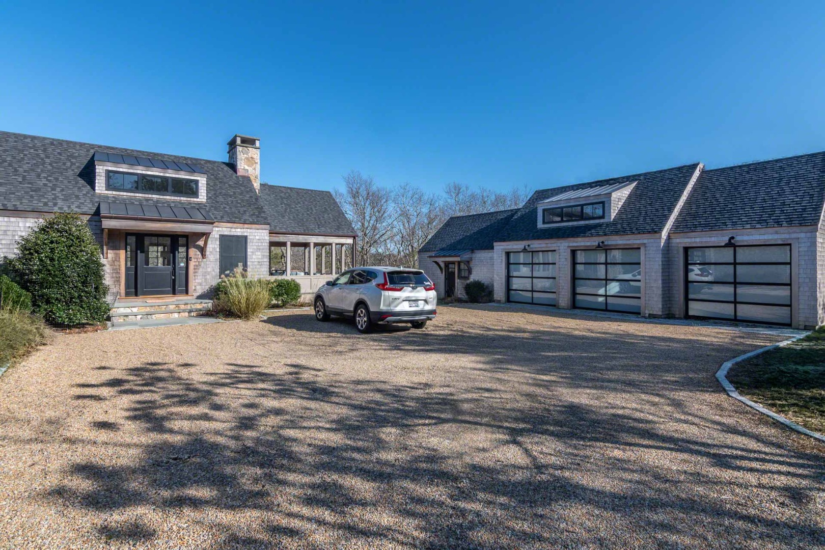 59 Seth's Way Edgartown, MA 02539 - Photo 44 of 46 a front view of a house with a yard