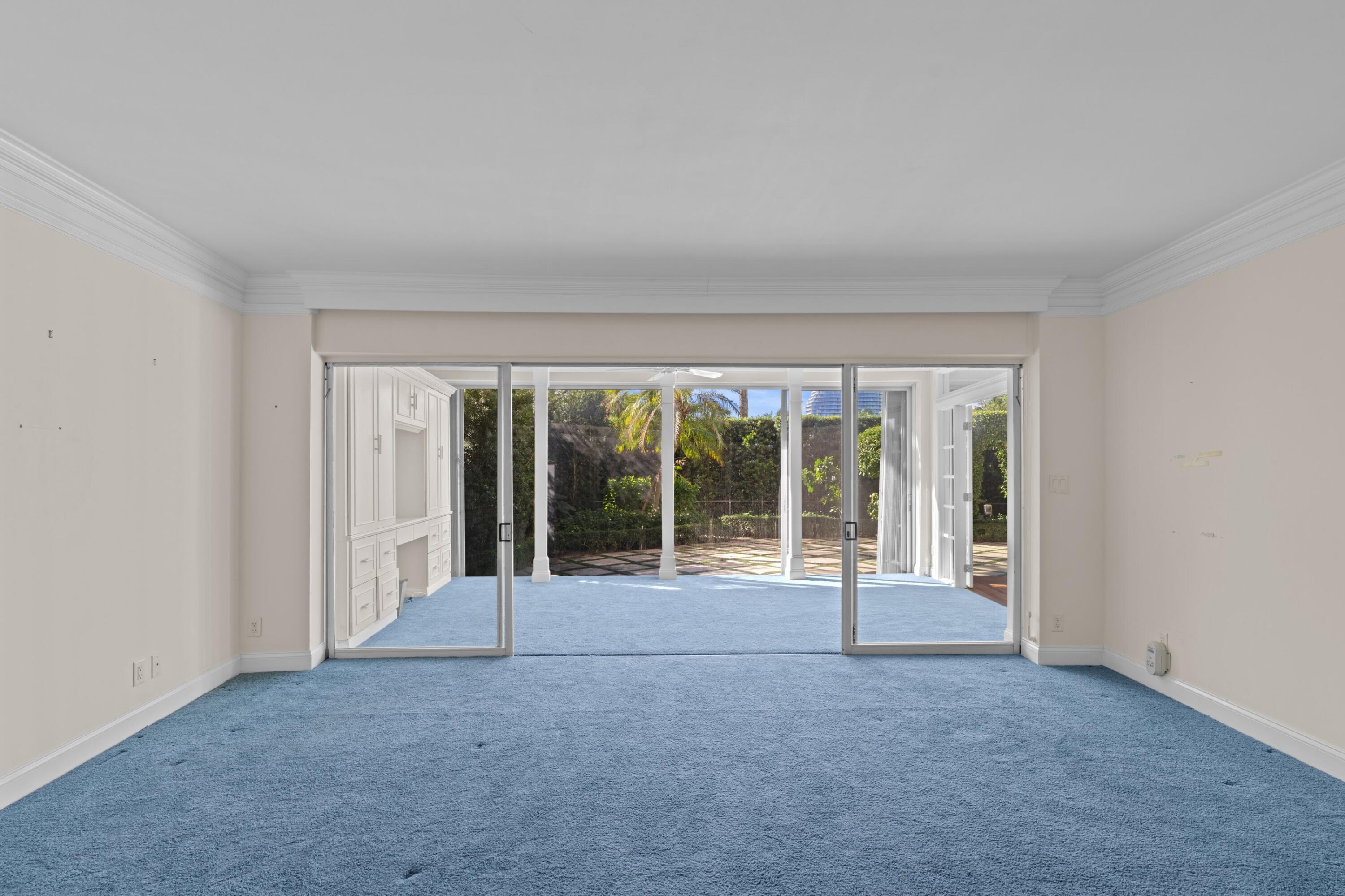 369 South Lake Drive, Unit 1D Palm Beach, FL 33480 - Photo 16 of 46 a view of an empty room with a fireplace
