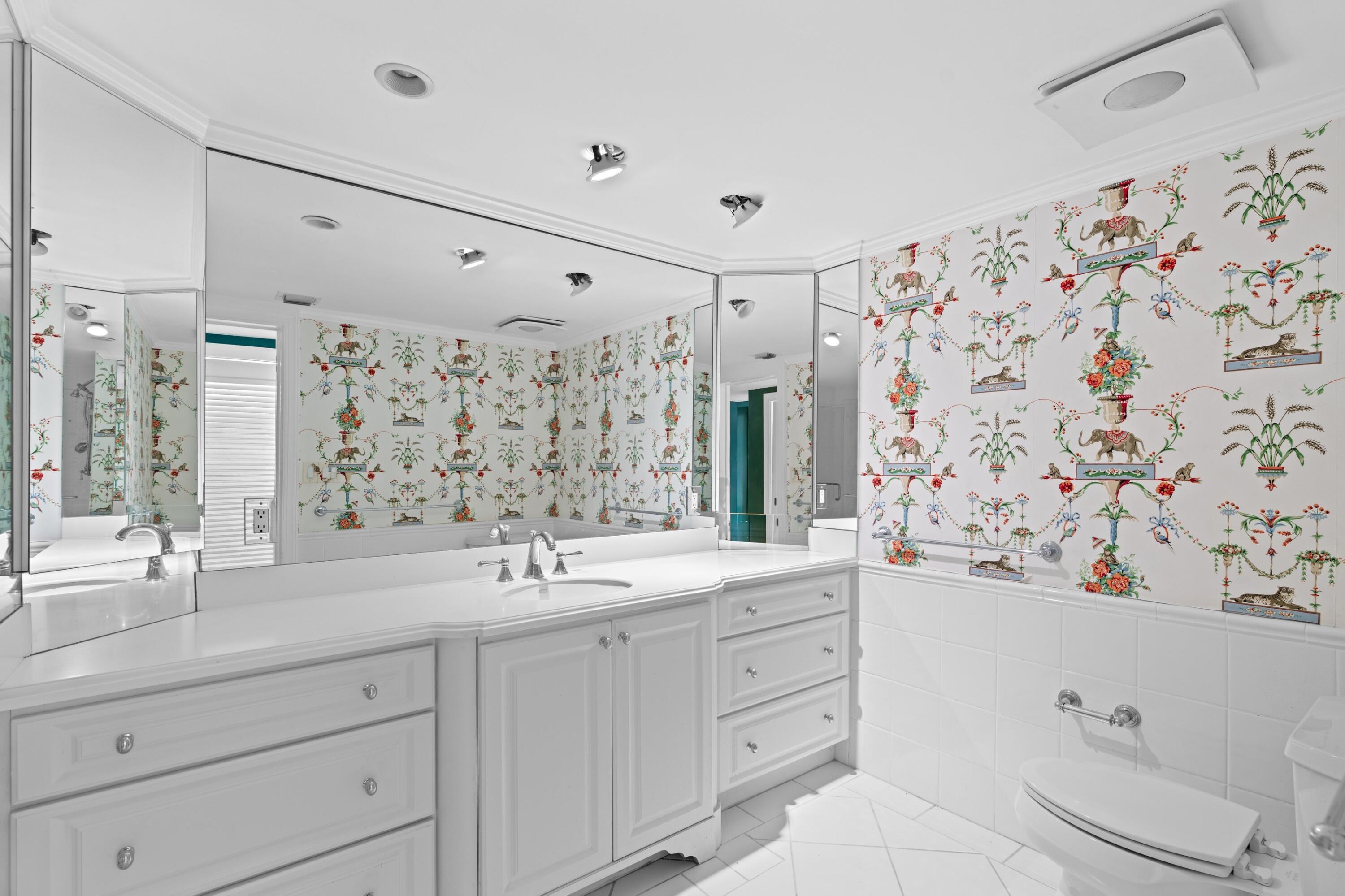 369 South Lake Drive, Unit 1D Palm Beach, FL 33480 - Photo 20 of 46 a bathroom with a double vanity sink mirror and double