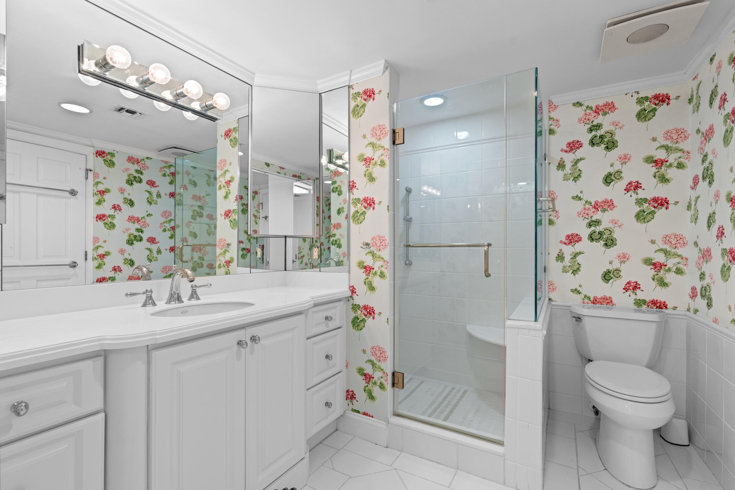 369 South Lake Drive, Unit 1D Palm Beach, FL 33480 - Photo 25 of 46 a bathroom with a sink toilet and shower