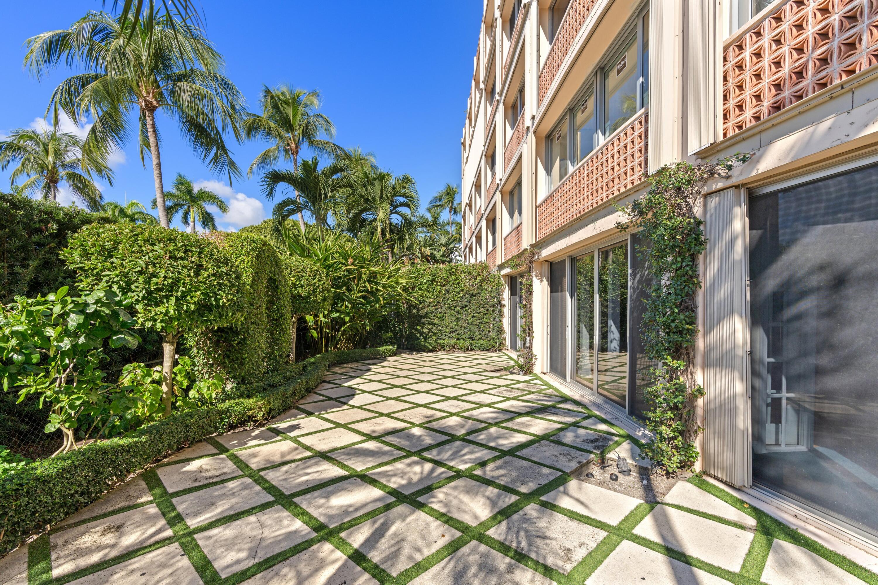 369 South Lake Drive, Unit 1D Palm Beach, FL 33480 - Photo 26 of 46 a view of a backyard