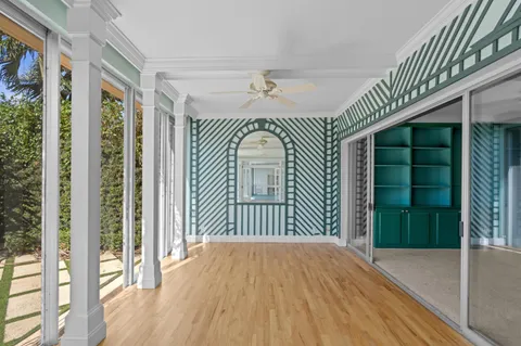 a view of entryway with wooden floor