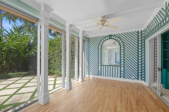 a view of entryway with wooden floor