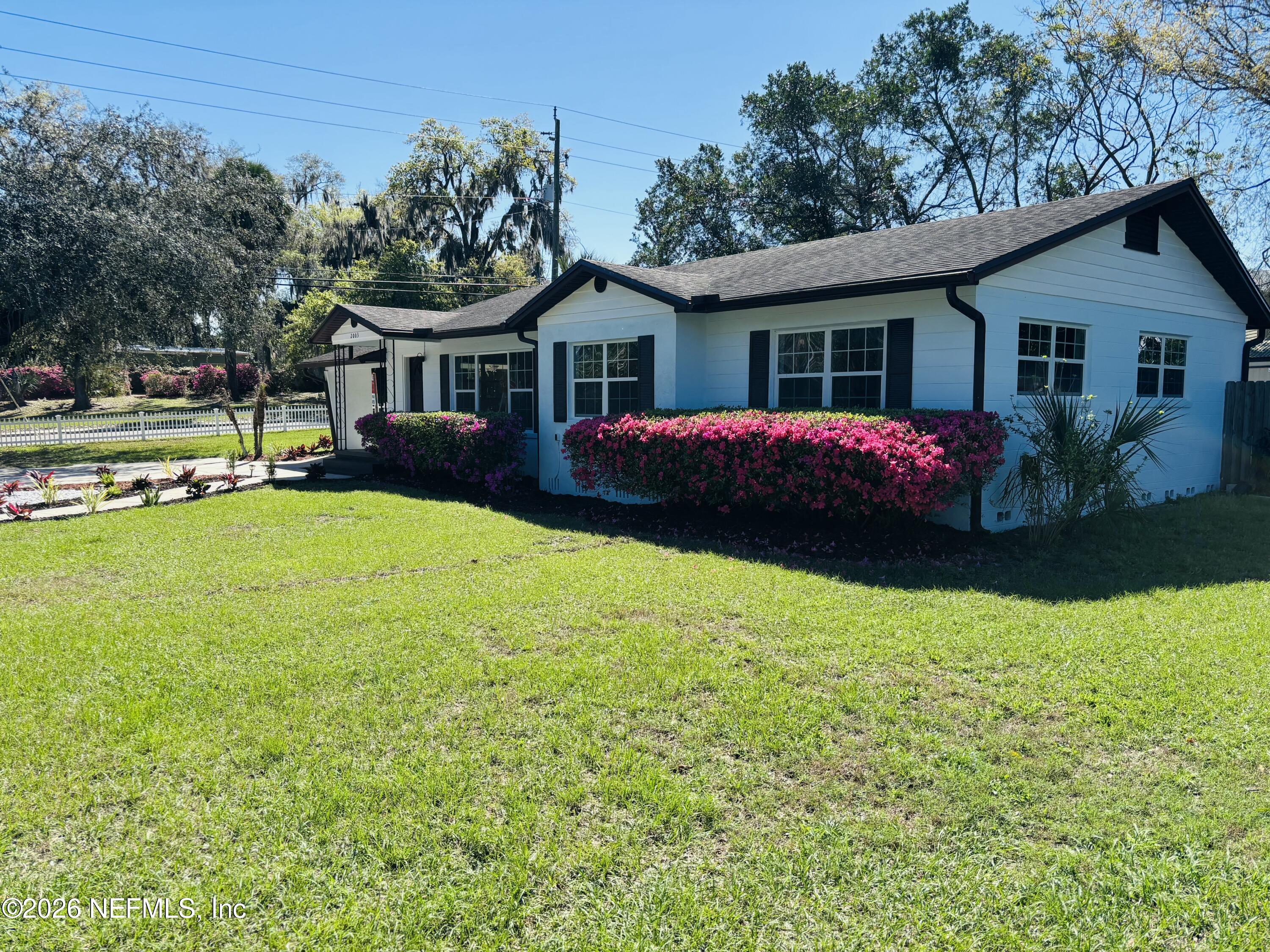 2003 Laurel Street Palatka, FL 32177 - Photo 28 of 31 a front view of house with yard and seating area