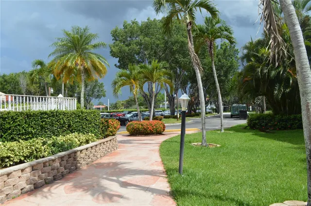 a view of a swimming pool with a lounge chairs