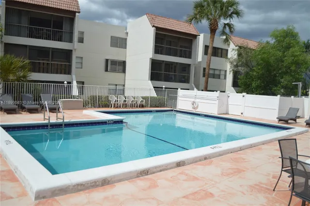 a view of balcony with furniture