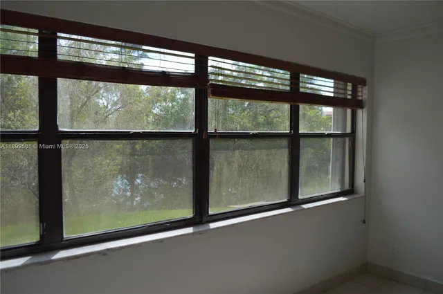 a view of a large window with an outdoor space