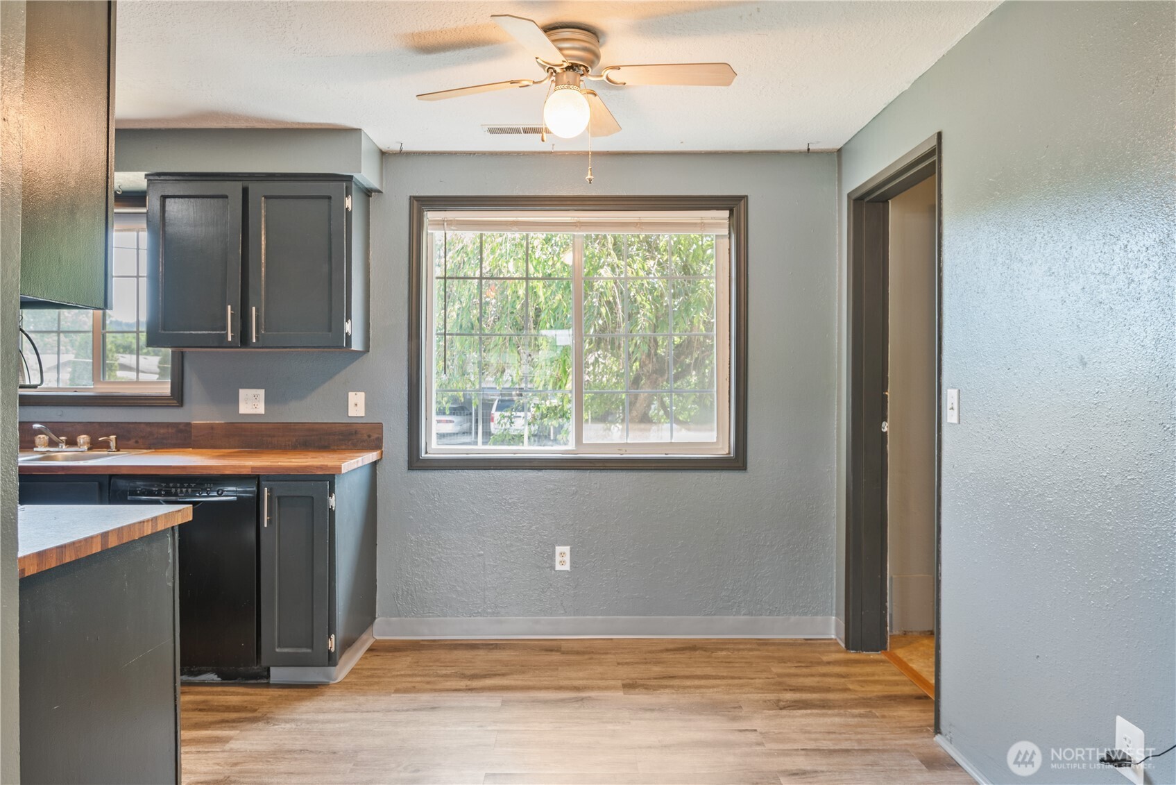 642 5th Avenue Southwest Castle Rock, WA 98611 - Photo 12 of 33 a view of room with kitchen island granite countertop furniture and a fireplace