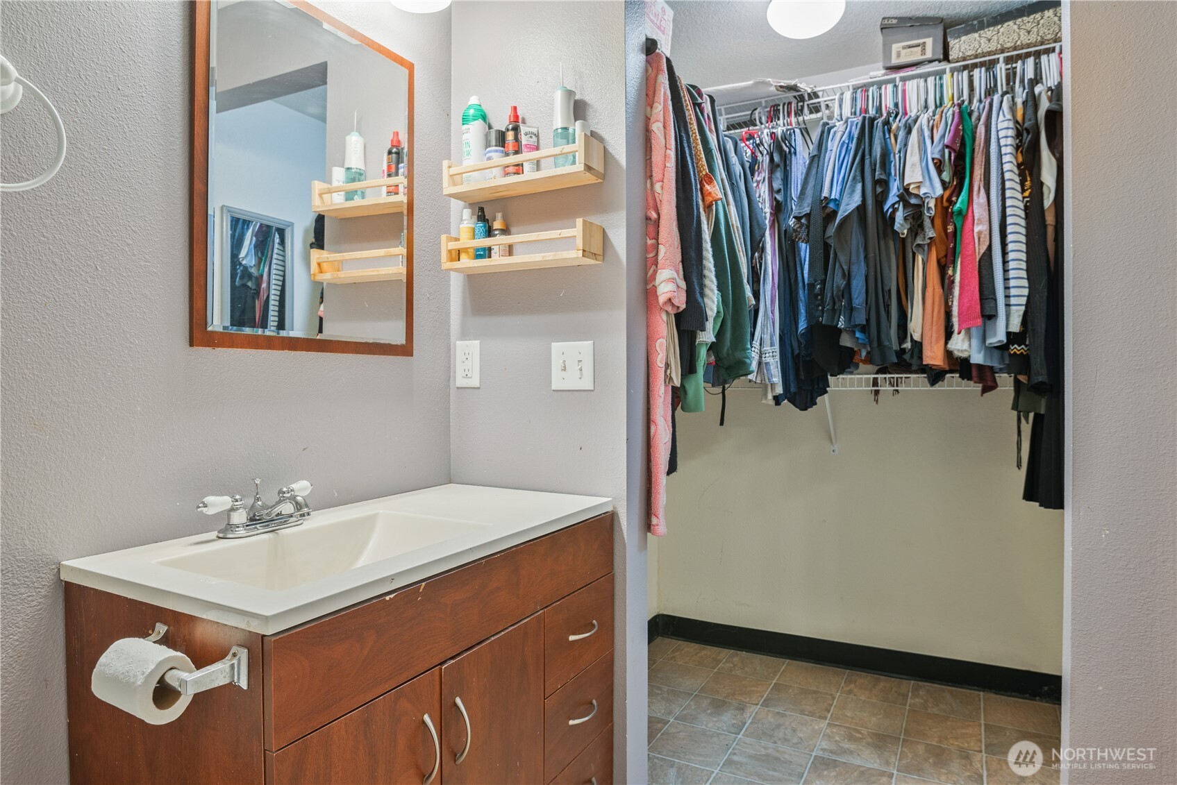 642 5th Avenue Southwest Castle Rock, WA 98611 - Photo 17 of 33 a bathroom with a sink mirror and shower