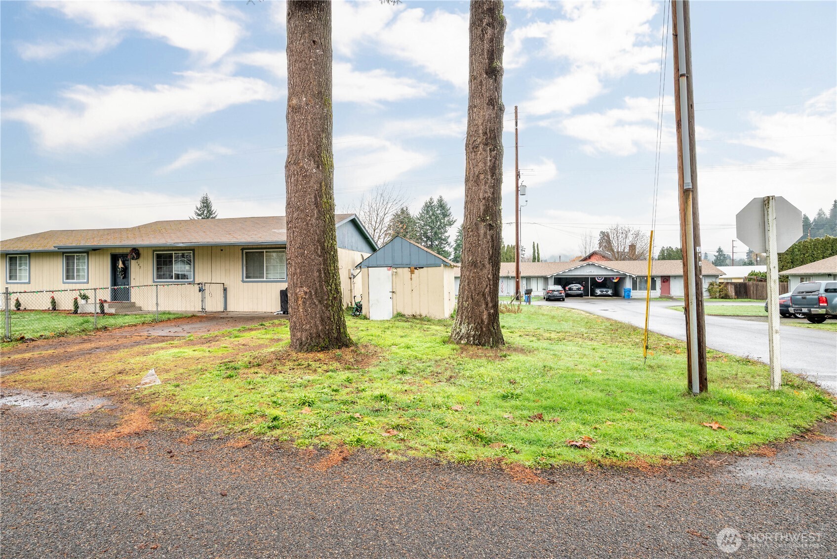 642 5th Avenue Southwest Castle Rock, WA 98611 - Photo 3 of 33 a swimming pool with yard and outdoor seating
