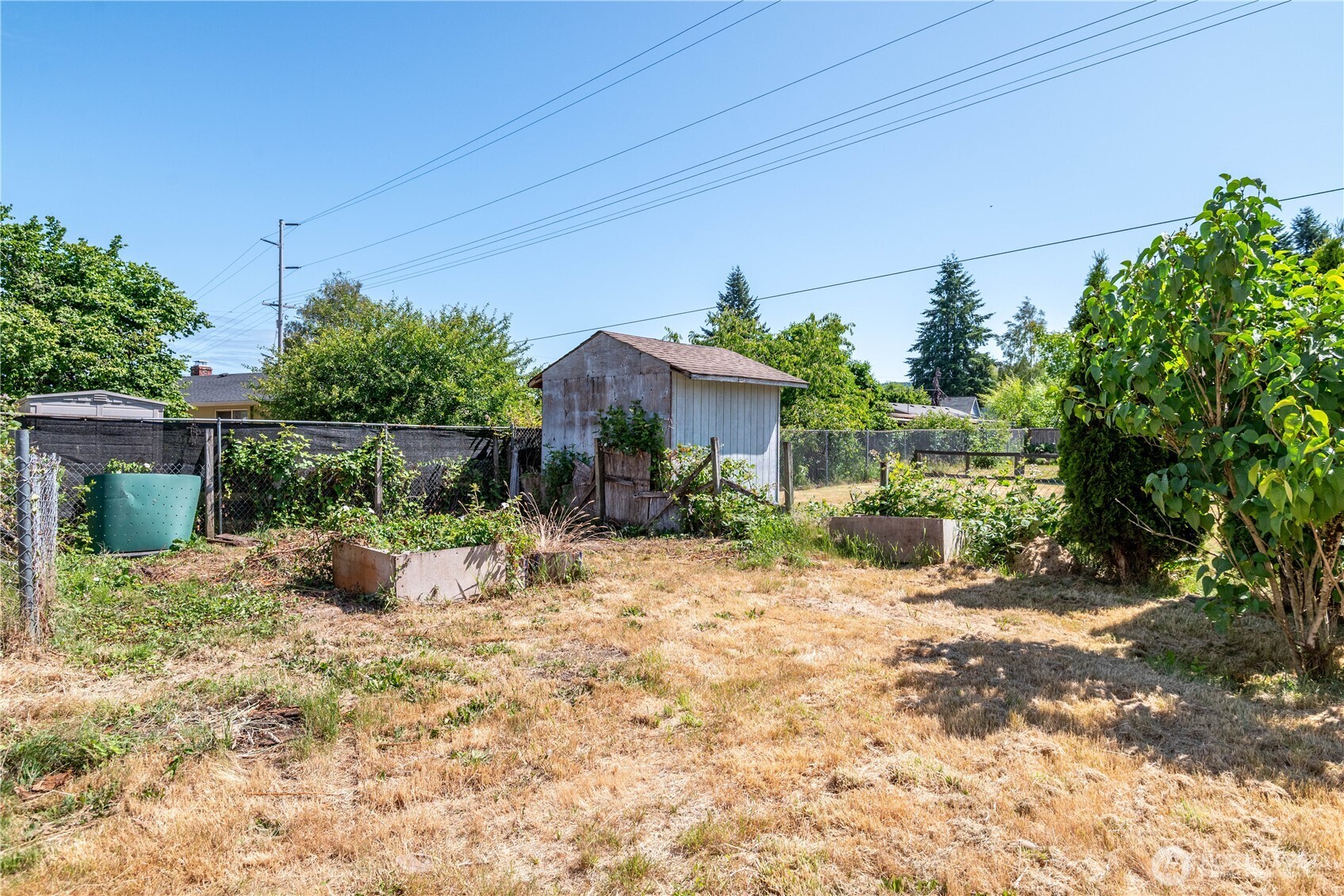 642 5th Avenue Southwest Castle Rock, WA 98611 - Photo 31 of 33 a view of a house with backyard and sitting area