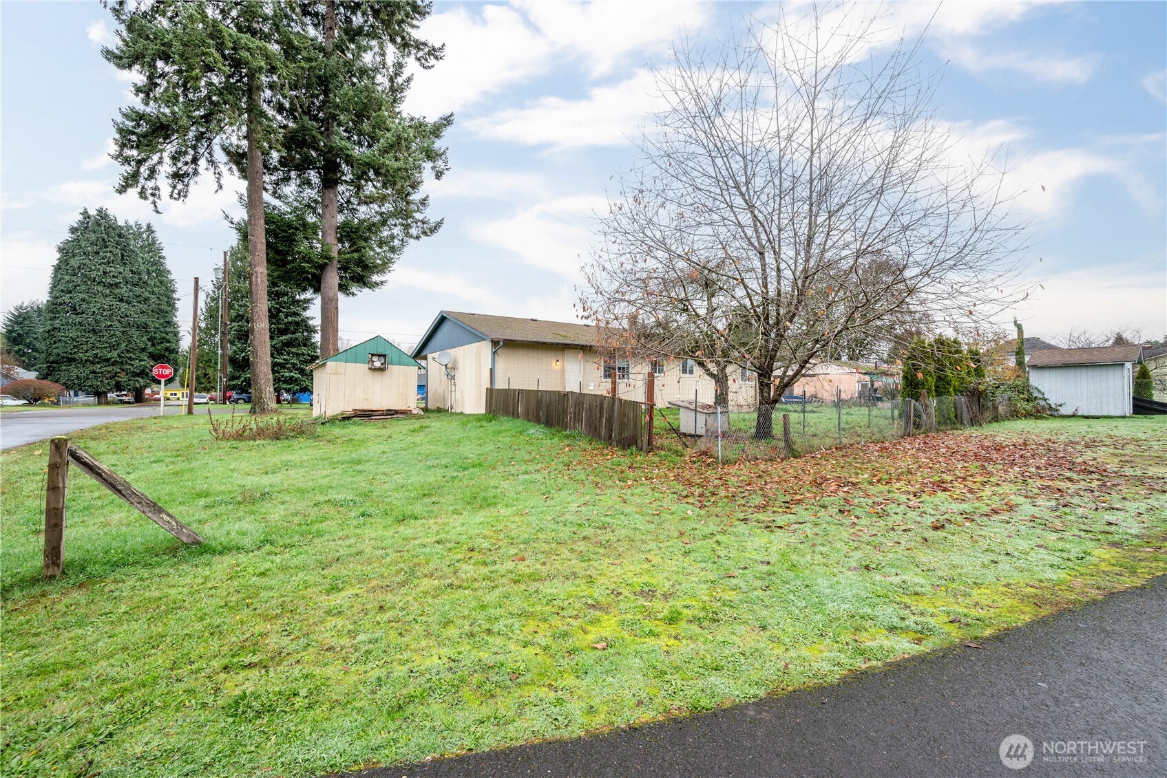 642 5th Avenue Southwest Castle Rock, WA 98611 - Photo 5 of 33 a view of a house with a yard