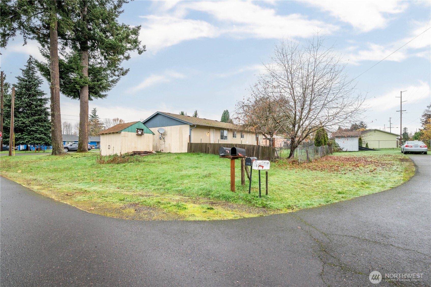 642 5th Avenue Southwest Castle Rock, WA 98611 - Photo 6 of 33 a view of a house with a backyard