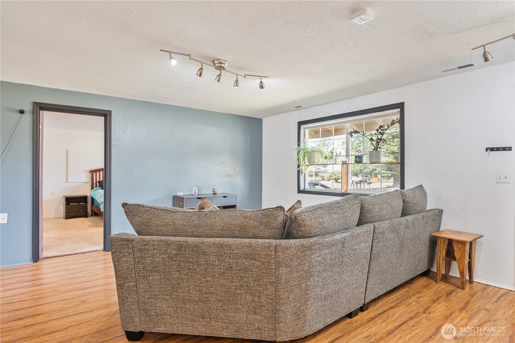 642 5th Avenue Southwest Castle Rock, WA 98611 - Photo 7 of 33 a living room with furniture and a window