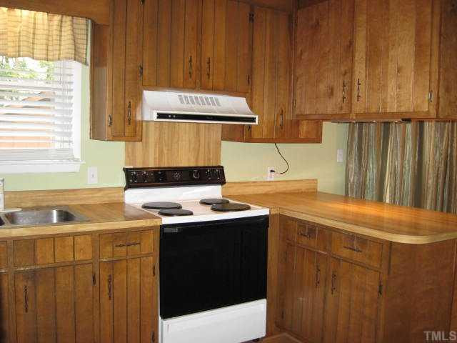 Second view of kitchen shows all the extra storage. Kitchen
