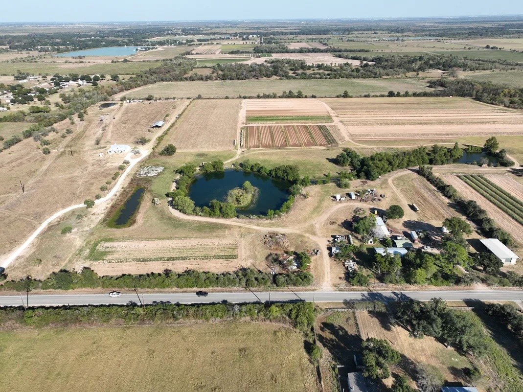 14134 Penick Road Waller, TX 77484 - Photo 15 of 20 an aerial view of residential houses with outdoor space