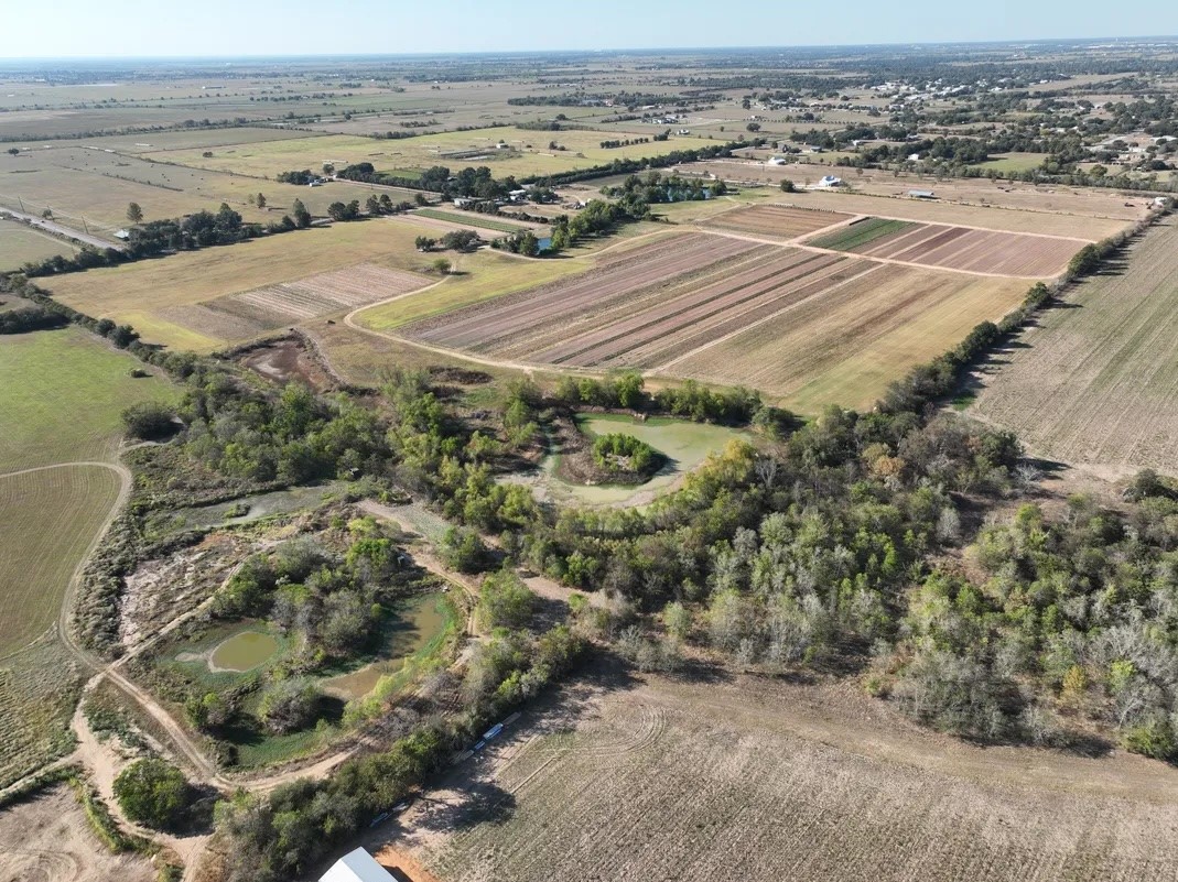 14134 Penick Road Waller, TX 77484 - Photo 4 of 20 an aerial view of residential houses with outdoor space
