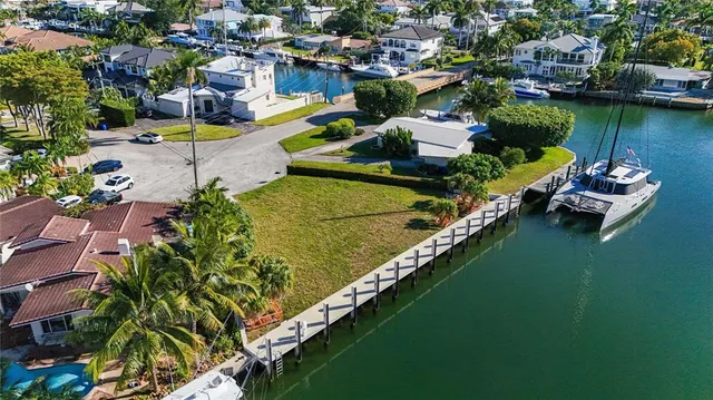 an aerial view of a house with a ocean view
