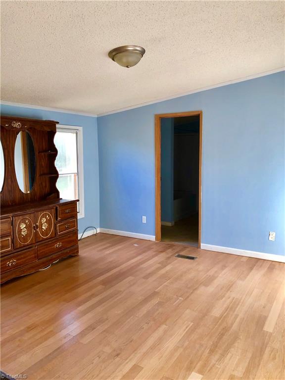 1595 Langley Loop Road Staley, NC 27355 - Photo 8 of 17 Master bedroom