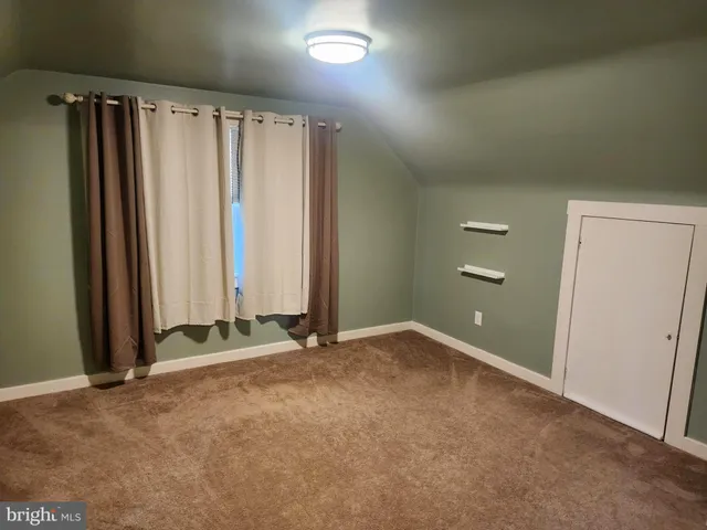 an empty room with a natural light