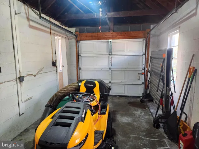 a view of yard with swimming pool and green space