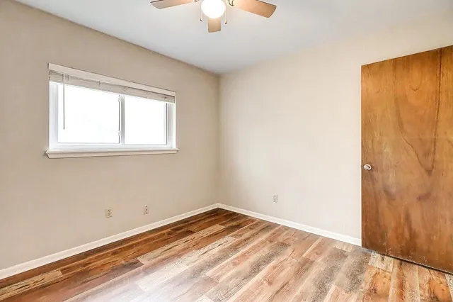 a view of a room that has a window in it