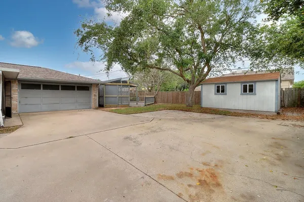 a house view with a outdoor space