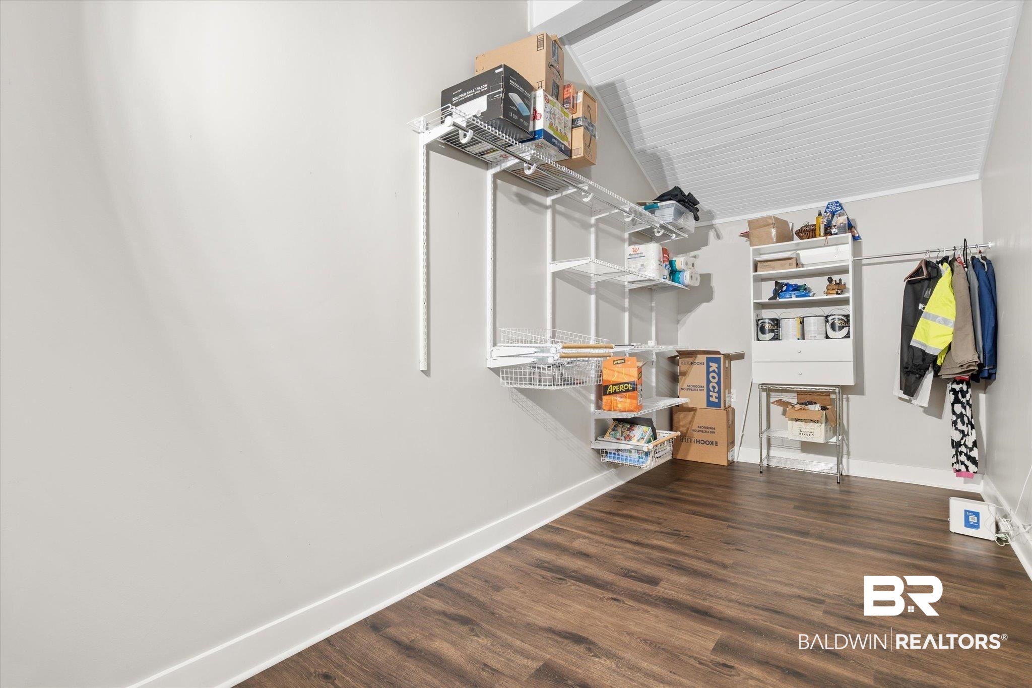 529 Cleveland Road Saraland, AL 36571 - Photo 19 of 31 Walk in closet featuring wood finished floors