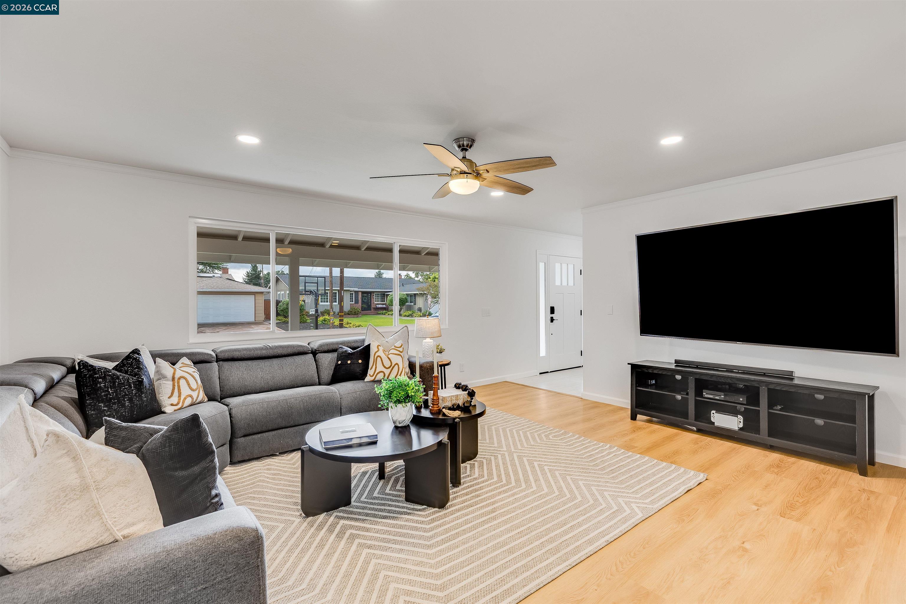 418 Devon Court San Ramon, CA 94583 - Photo 9 of 62 a living room with furniture and a flat screen tv