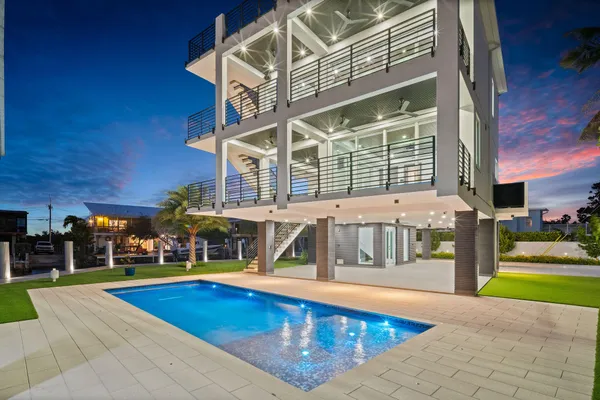 a view of a house with a swimming pool