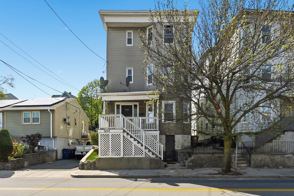 1661 North Shore Road Revere, MA 02151 - Photo 1 of 42 a front view of a house with entertaining space