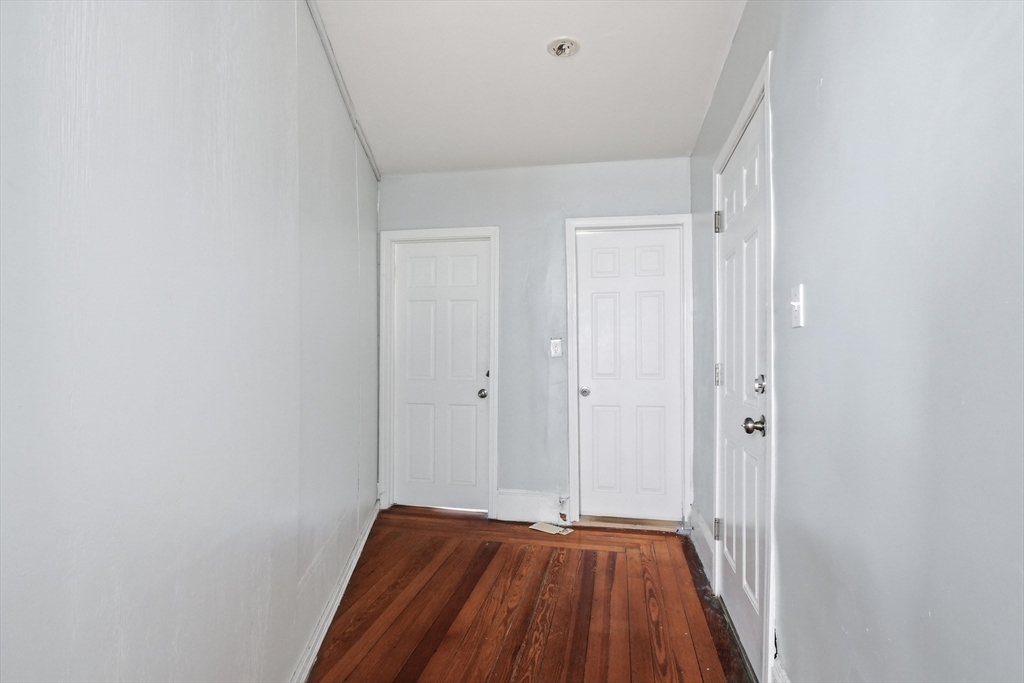 1661 North Shore Road Revere, MA 02151 - Photo 25 of 42 a view of a hallway with wooden floor