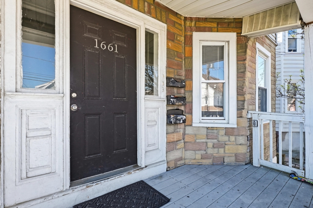 1661 North Shore Road Revere, MA 02151 - Photo 3 of 42 a view of front door of house