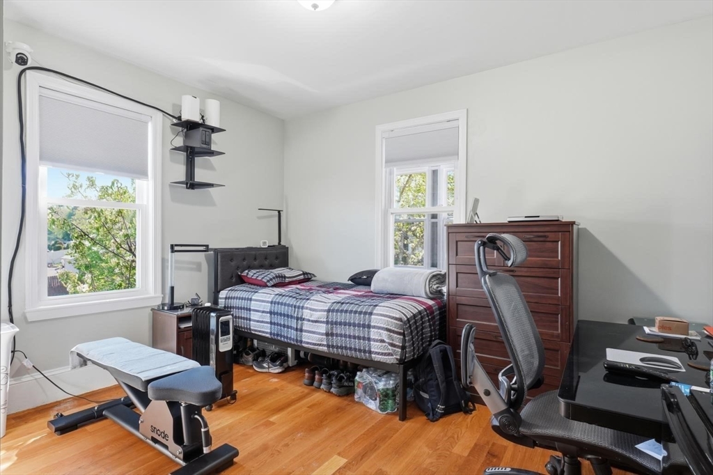 1661 North Shore Road Revere, MA 02151 - Photo 37 of 42 a bedroom with furniture and a window