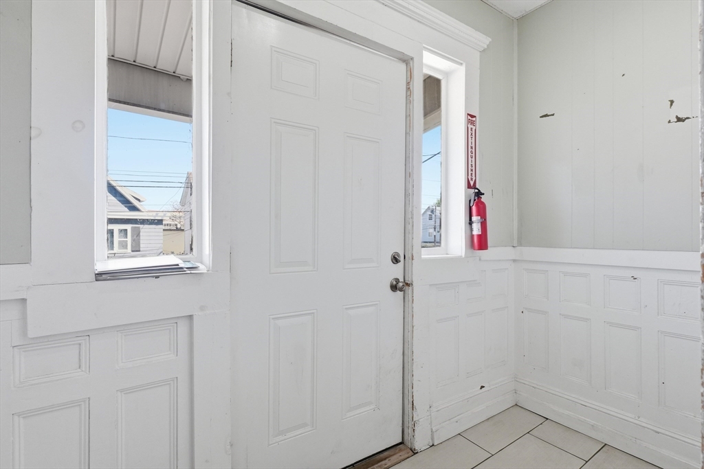 1661 North Shore Road Revere, MA 02151 - Photo 40 of 42 a bathroom with a bathtub
