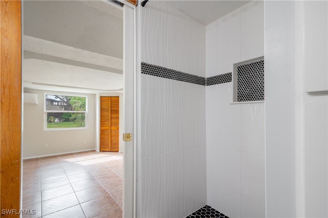 8025 Anhinga Road Fort Myers, FL 33967 - Photo 11 of 47 a view of an empty room with windows