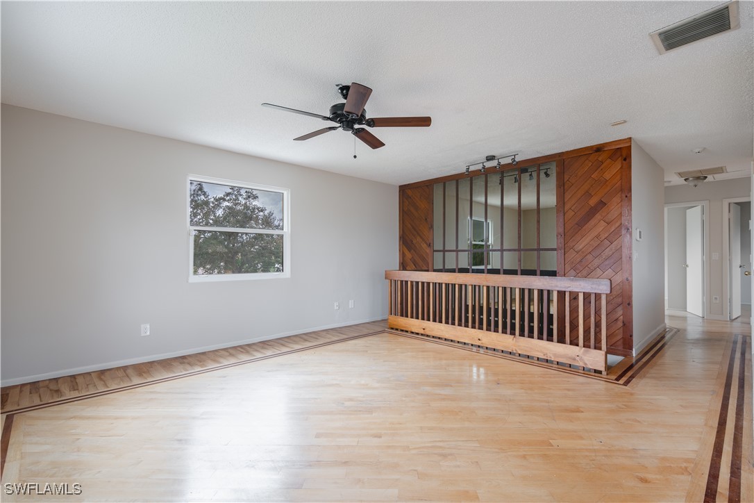 8025 Anhinga Road Fort Myers, FL 33967 - Photo 18 of 47 a view of livingroom with hardwood floor